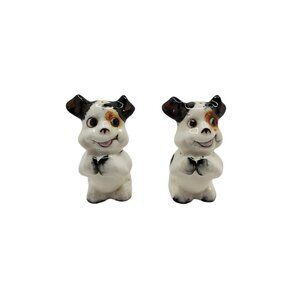 vintage 1950s porcelain made in japan animated dogs salt and pepper shakers.